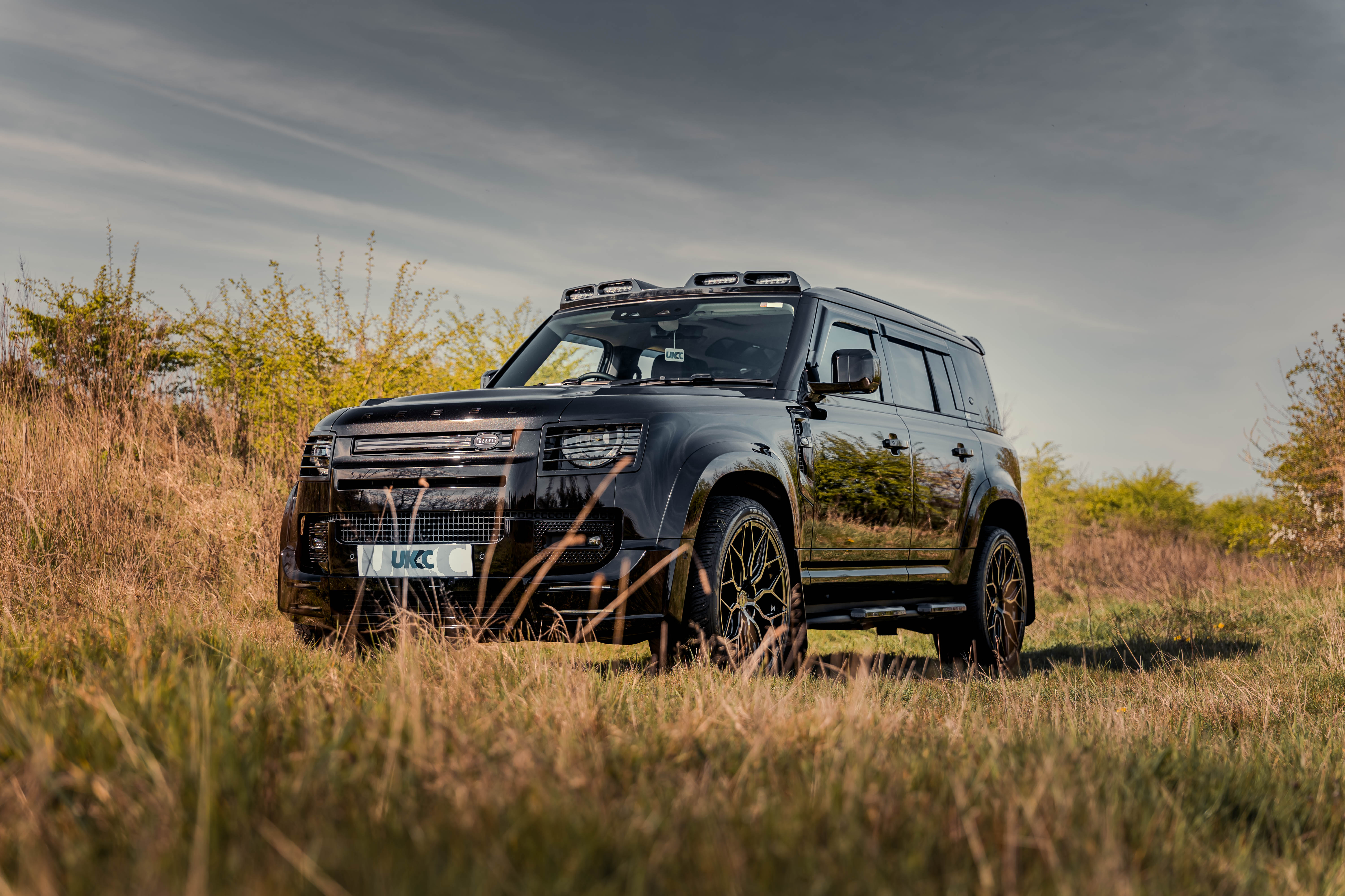 UKCC Rebel Land Rover Defender farm land